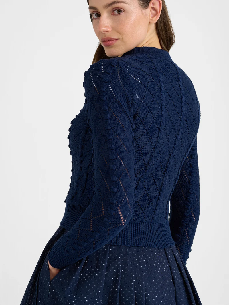 Strickjacke mit Stehkragen und Bommeln