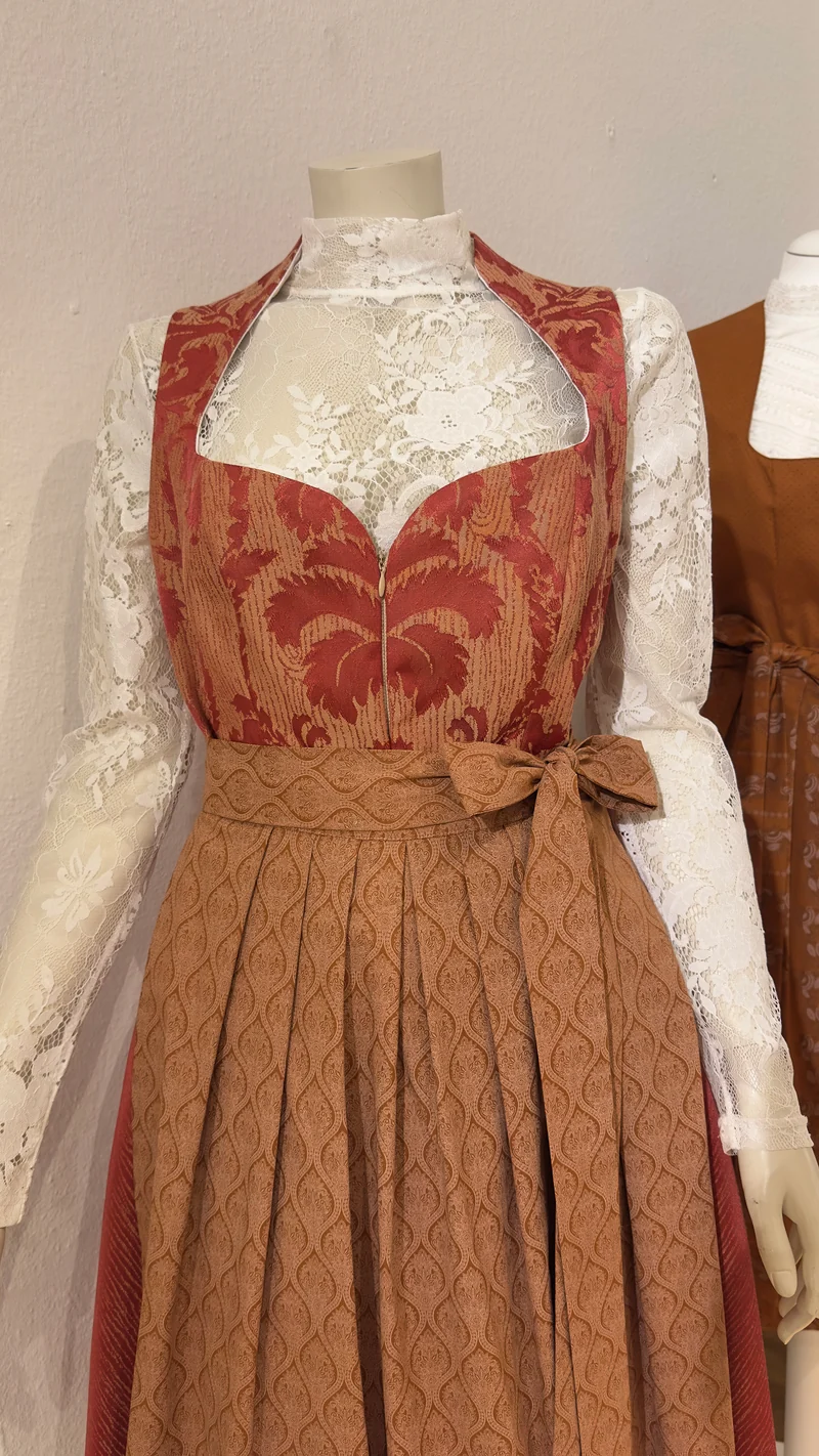 Dirndl Goldstich orange 75cm