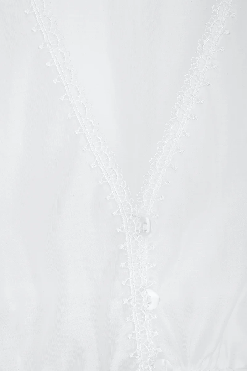 Dirndlbluse transparent glänzend
