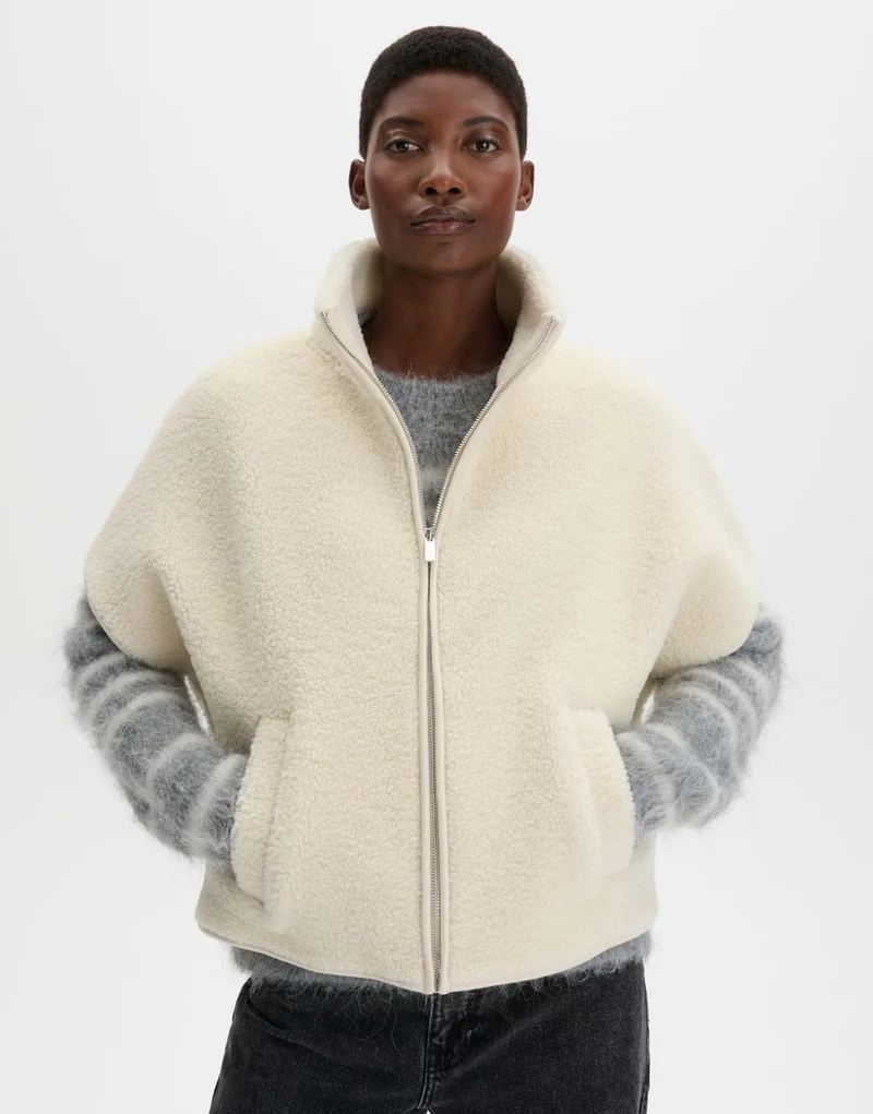 UKARA Cape aus weichem Teddyfell