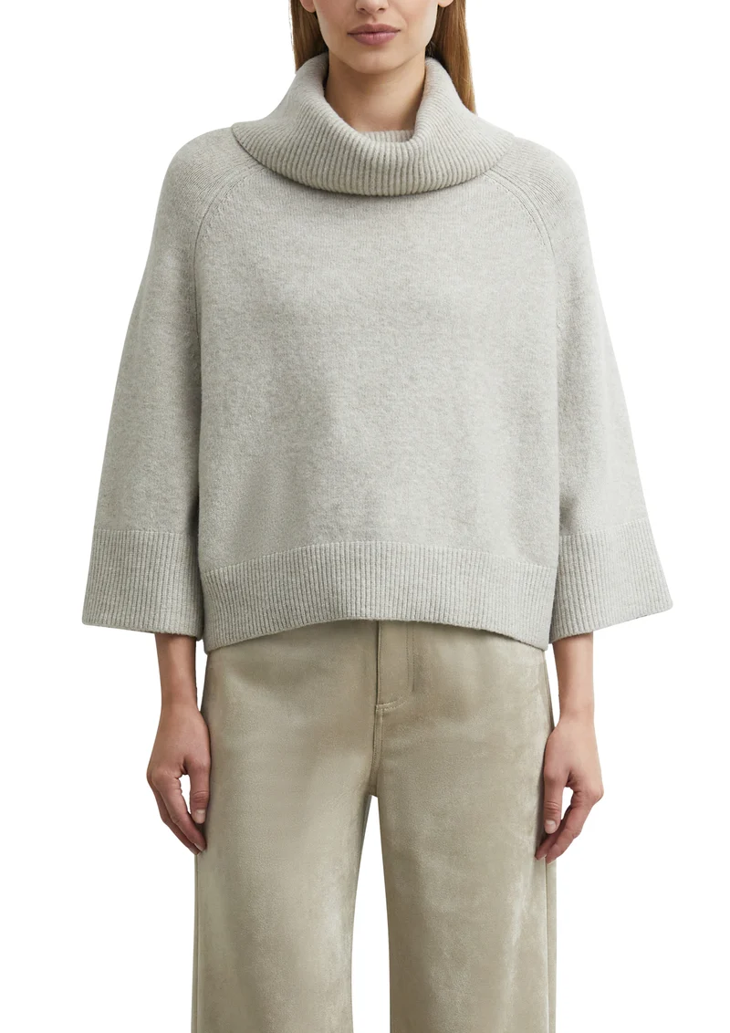 Strickpullover im Poncho-Stil
