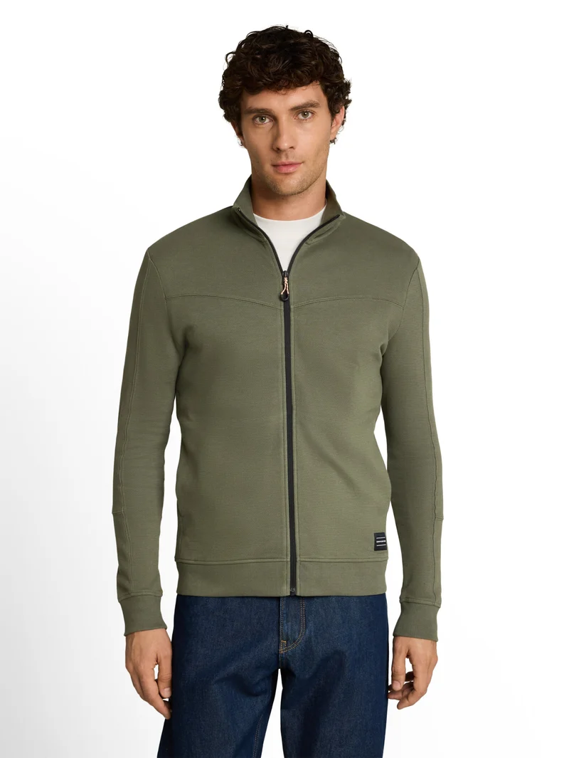 Sweatjacke mit Stehkragen und Rippdetails