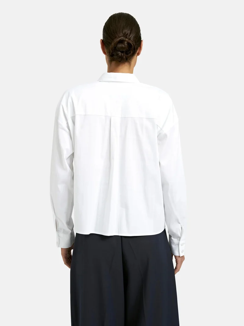 Überlappende Taschenbluse